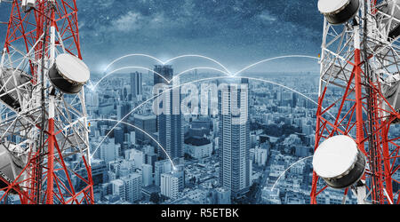 Networking and internet network technology in the city. Telecommunication towers with cityscape and networking lines Stock Photo