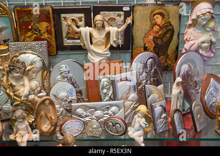 Religious icons in shop window display Madrid Stock Photo - Alamy