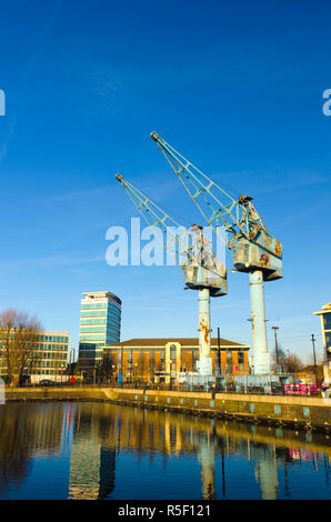 UK, England, Greater Manchester, Salford, Salford Quays, Ontario Basin, disused dock cranes Stock Photo