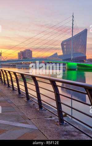 Imperial War Museum North and the MediaCityUK swing footbridge at night ...