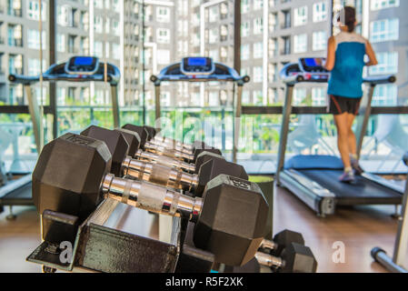 dumbbells in the gym at sports club for exercise and Bodybuilding Stock Photo