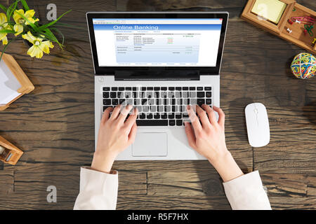 Businesswoman Doing Online Banking Stock Photo