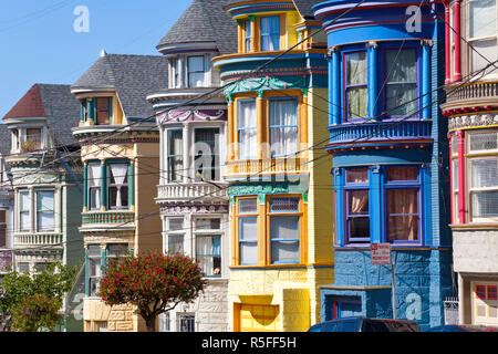 Colourfully painted Victorian houses in the Haight-Ashbury district of San Francisco, California, USA Stock Photo