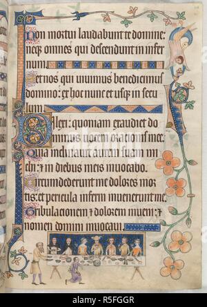 The Luttrell family feasting.  . The Luttrell Psalter. 1325-1340. Source: Add. 42130 f.208. Language: Latin. Stock Photo