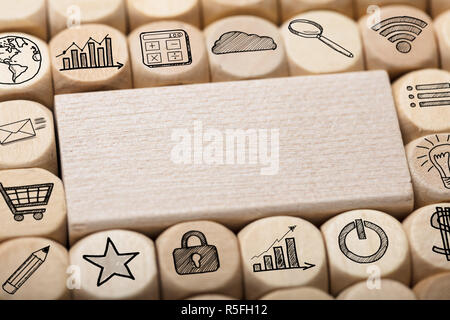 Wooden Block Surrounded By Various Computer Icons Stock Photo
