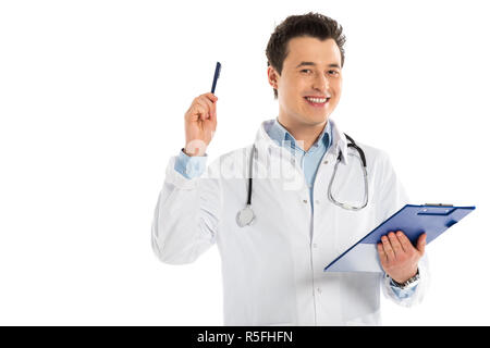 male doctor looking at camera, holding diagnosis and pointing with pen isolated on white Stock Photo