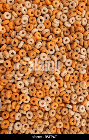 Healthy multigrain hoops breakfast cereal background Stock Photo