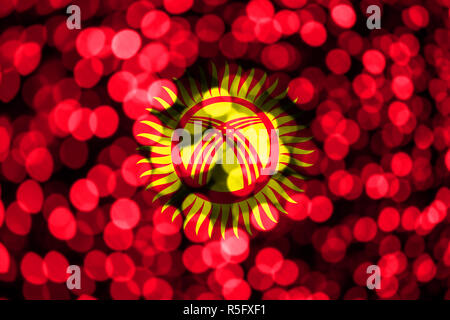 Kyrgyzstan abstract blurry bokeh flag. Christmas, New Year and National day concept flag. Stock Photo