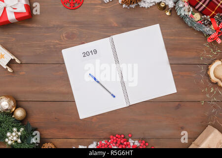 New Year 2019. Opened notebook isolated on table top view close-up Stock Photo