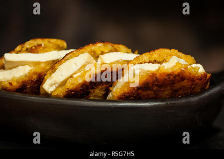 Arepas de choclo filled with white cheese Stock Photo