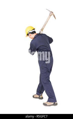 Man in uniform hold old pick mattock that is a mining device Stock Photo