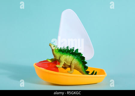 dinosaur on a boat Stock Photo