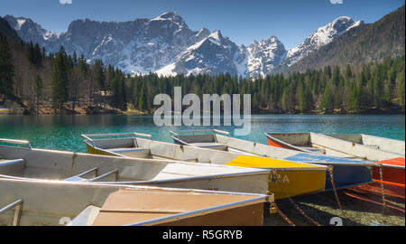 boats near lake lagho di fusine in italian alps near udine Stock Photo