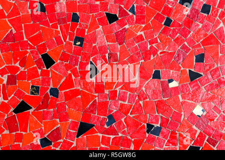 Background from red and black mosaic pattern, close up. Stock Photo