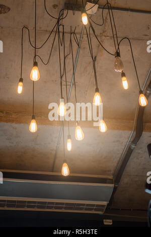 Antique light bulbs hanging on the ceiling Stock Photo