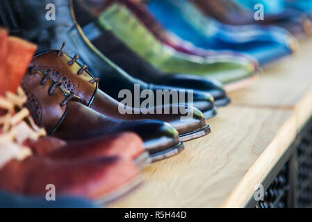 close up on mens leather shoes in the row Stock Photo