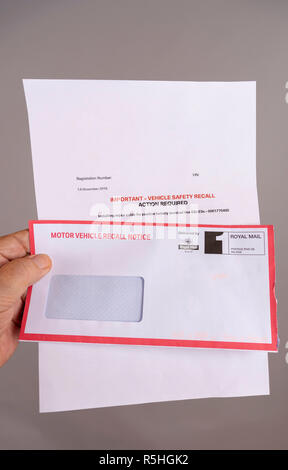 Official notification letter and envelope for a UK car safety recall Stock Photo