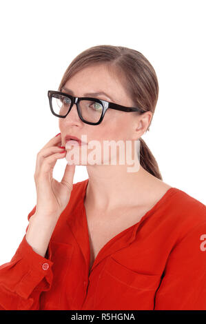 Troubled  young woman with glasses in portrait Stock Photo