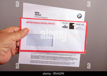 Official notification letter and envelope for BMW car vehicle safety recall. Stock Photo