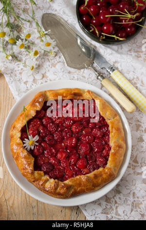 Cherry galette on a white background Stock Photo