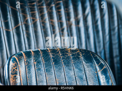 Old leather vintage car seat detail. Stock Photo