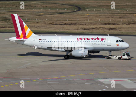 Germanwings Airbus A319-100 with registration D-AGWD on pushback at Cologne Bonn Airport. Stock Photo