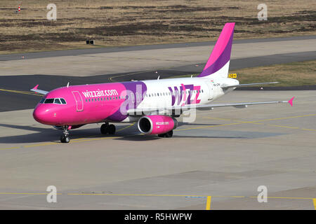 Hungarian Wizz Air Airbus A320-200 with registration HA-LPM taxiing to terminal. Stock Photo