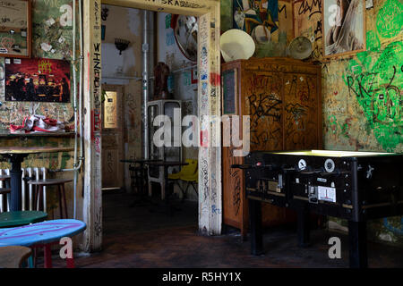 BUDAPEST, HUNGARY - August 12, 2018: Pub interiors with vintage furniture in Szimpla kert ruin pub and farmers market, a popular tourist destinations  Stock Photo