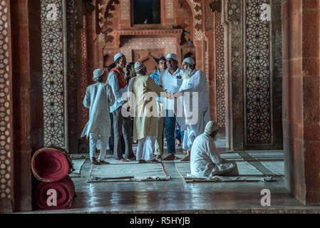 Faithful people at the Jama Masjid, Fatehpur Sikri Fort, Uttar Pradesh, India Stock Photo