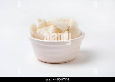 A white bowl of prawn crackers Stock Photo