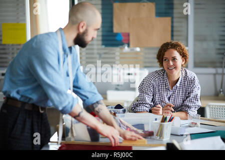 Talking to colleague Stock Photo