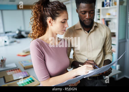 Experts with papers Stock Photo
