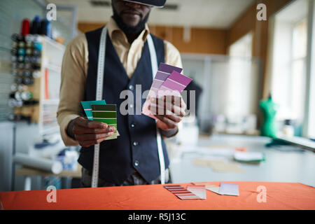 Tailor with palettes Stock Photo