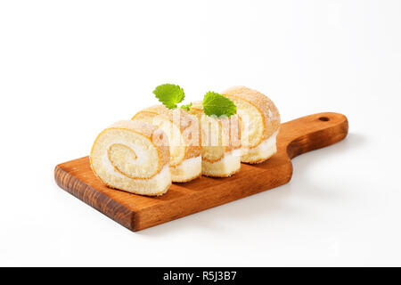 Slices of cream Swiss roll Stock Photo