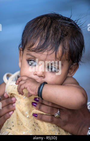 Portrait of a small baby child with kajal eyeliner, Amer, Rajasthan, India Stock Photo