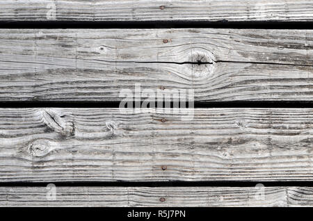Old silvered and weathered wood plank background Stock Photo