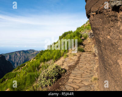 Hiking trail from Pico Ruivo to Pico Arieiro through the volcanic mountain range of the island of Madeira, Portugal Stock Photo