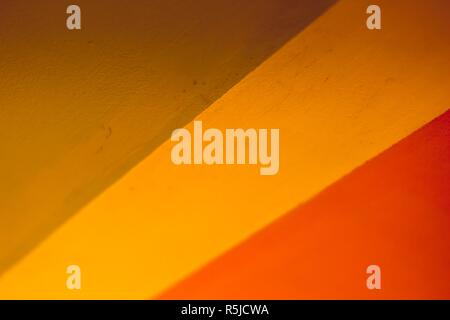 Green, yellow and red smooth on a concrete surface. Bright and juicy colors. Stock Photo