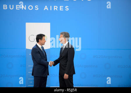 Buenos Aires, Argentina. 1st December, 2018. Argentina. 1st December 2018. Argentine President Mauricio Macri, right, welcomes Italian Prime Minister Giuseppe Conte at the start of the G20 Summit meeting at the Costa Salguero Center November 30, 2018 in Buenos Aires, Argentina. Credit: Planetpix/Alamy Live News Credit: Planetpix/Alamy Live News Stock Photo