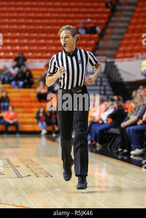 Stillwater, OK, USA. 30th Nov, 2018. A referee runs up court during a basketball game between the Texas State Bobcats and Oklahoma State Cowgirls at Gallagher-Iba Arena in Stillwater, OK. Gray Siegel/CSM/Alamy Live News Stock Photo