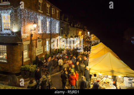 Bewdley, UK. 1st December, 2018. There is a feeling of real community spirit and festive fun this evening as the folk of Bewdley come together to support the town's annual Christmas lights switch-on and traditional Victorian Christmas Market. Hosted by local radio station BBC Hereford and Worcester, with live band entertainment from Gasoline & Matches, crowds ensure this is an evening which truly celebrates advent and the revelry of the festive season. Credit: Lee Hudson/Alamy Live News Stock Photo