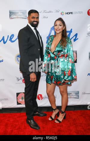 Beverly Hills, California, USA. 30th November, 2018. Prince Raj and guest attending the Artist Gao Quanqiang Contemporary Chinese Ink Exhibition held at Pacific Holdings Group in Beverly Hills, California on November 30, 2018. Credit: Sheri Determan/Alamy Live News Stock Photo