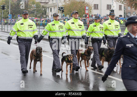 European street, Prague-October 28, 2018: Customs officers with service dogs are marching on military parade for 100th anniversary of creation Czechos Stock Photo