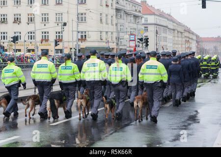 European street, Prague-October 28, 2018: Customs officers with service dogs are marching on military parade for 100th anniversary of creation Czechos Stock Photo