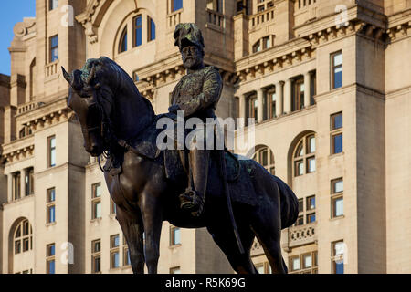 Liverpool Waterfront The Port Liver Building frames the The Three Graces  Equestrian statue of King Edward VII Stock Photo