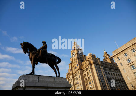 Liverpool Waterfront The Port Liver Building frames the The Three Graces  Equestrian statue of King Edward VII Stock Photo