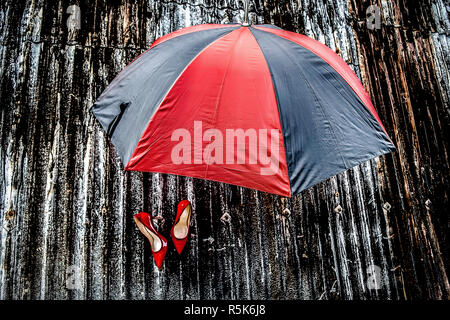 Umbrella and heels Stock Photo