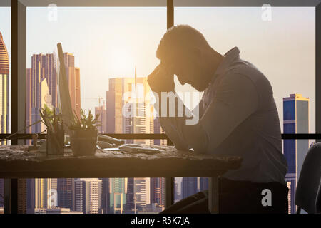 Businessman Suffering From Headache Stock Photo