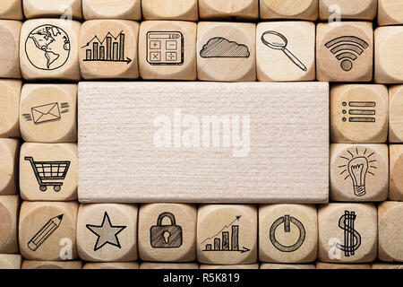 Wooden Block Surrounded By Various Computer Icons Stock Photo