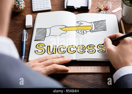 Relay Baton And Success Concept Stock Photo